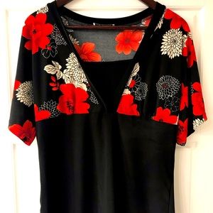 Blouse to die for.